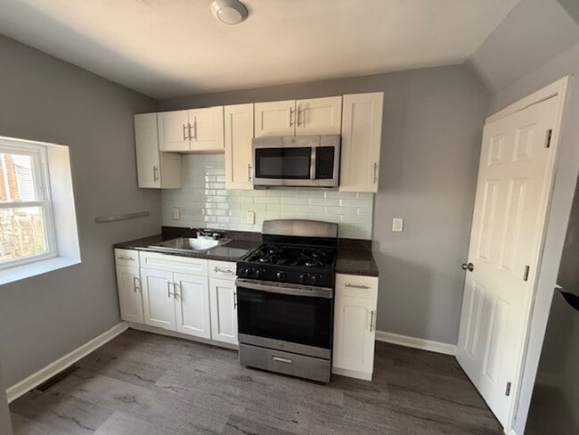 Building Photo - Renovated 3-Bedroom Home with Porch Front ...