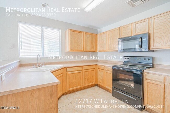 Foto del edificio - 12717 W Laurel Ln