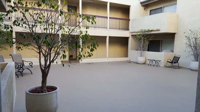 Courtyard - 4740 Warner Ave Apartments