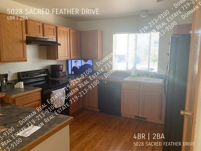 Foto del edificio - 5028 Sacred Feather Dr