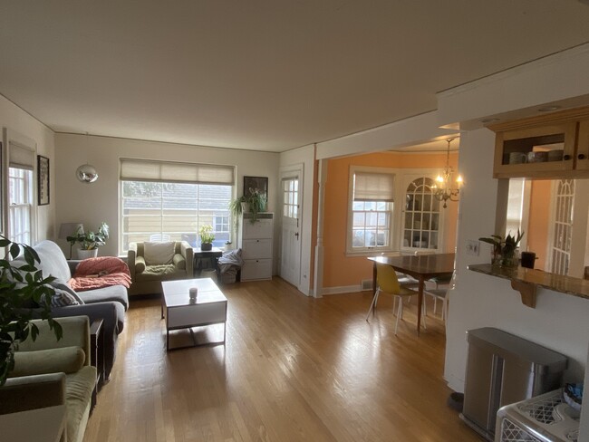 Open concept and freshly painted living spaces with tons of natural light - 4015 N Murray Ave