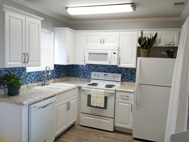 Kitchen with new Farberware pots and oans - 17214 Front Beach Rd