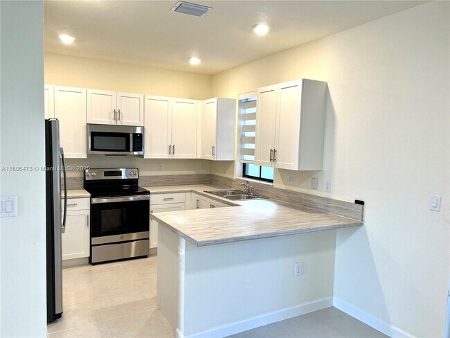 Building Photo - 11088 W 33rd Way