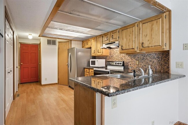 Building Photo - 11540 W 70th Pl