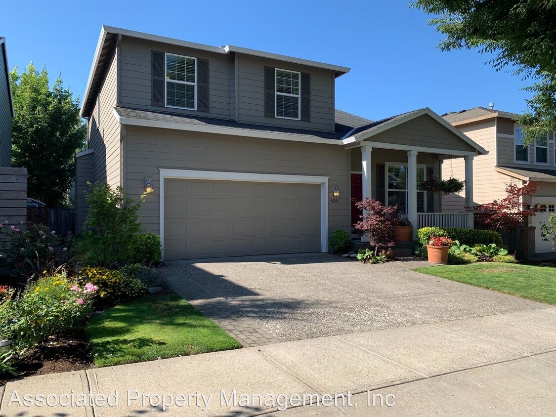 Foto principal - 4 br, 2.5 bath House - 626 NW Tree Haven Dr