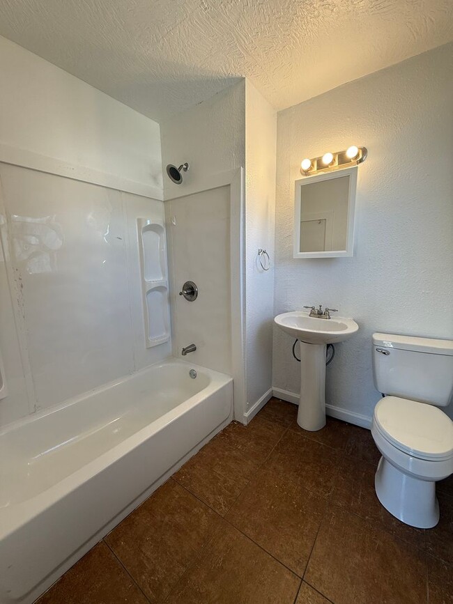 Building Photo - Big style, small footprint—welcome to living done right!