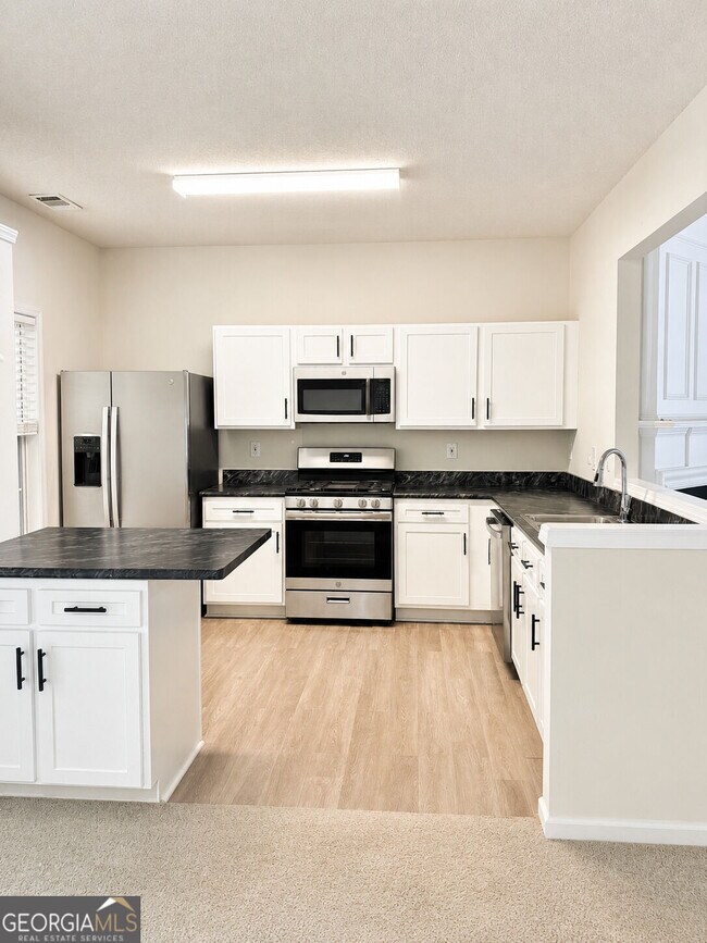 Building Photo - 9155 Nesbit Ferry Rd