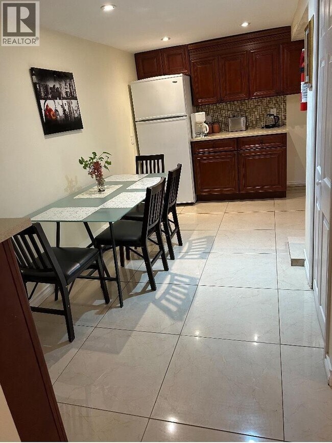 Photo du bâtiment - 1476 W 33rd Ave