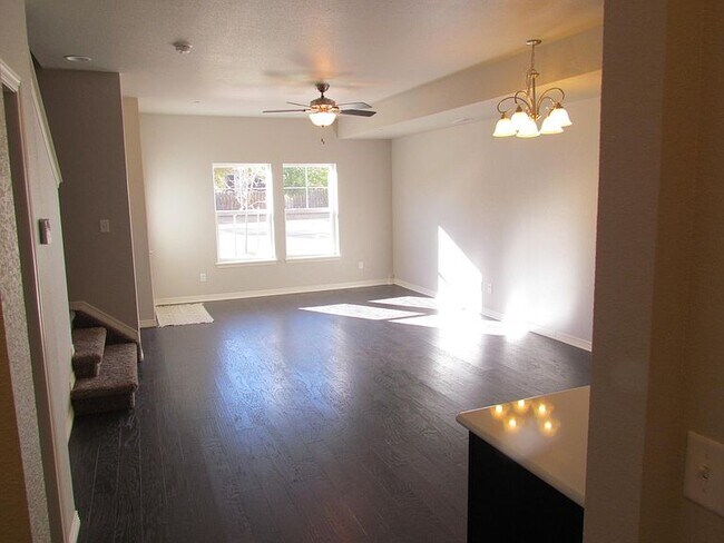 The open concept family room and dining room. - 3800 Manhattan Ave