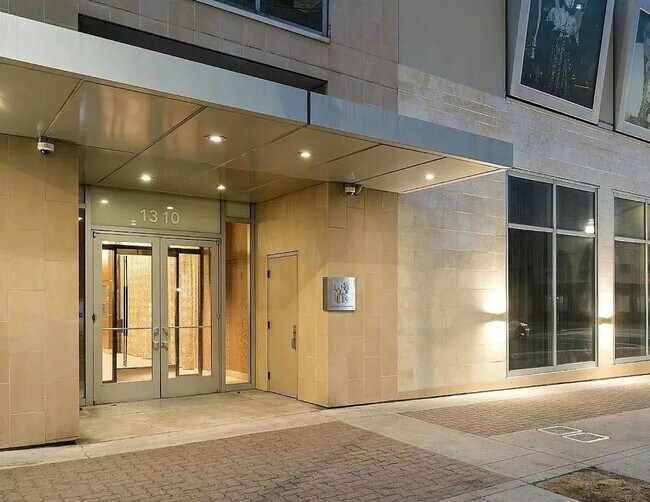 Building Photo - Corner Light. City Energy. Zero Compromise.