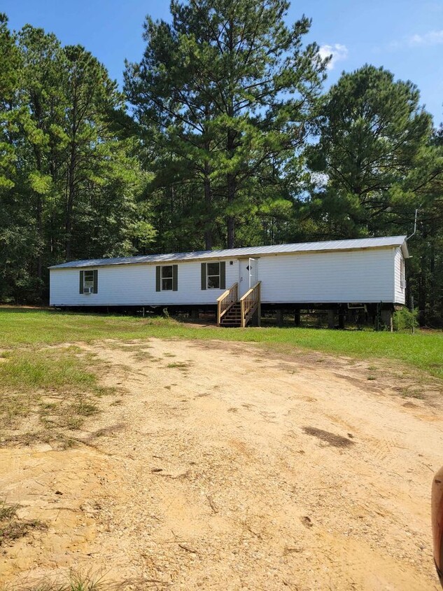 Primary Photo - Mobile home sits on 3 acres of land in Lea...