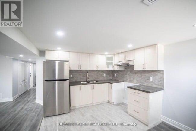 Photo du bâtiment - 46 Epsom Downs Dr