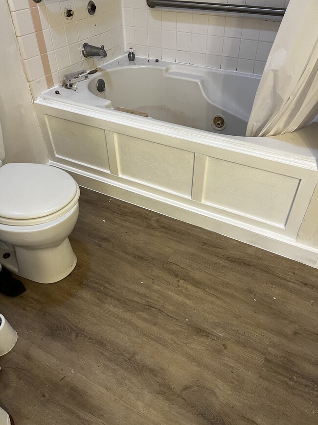Jacuzzi tub and new plank floors in bathroom - 1788 Blakeslee Ave