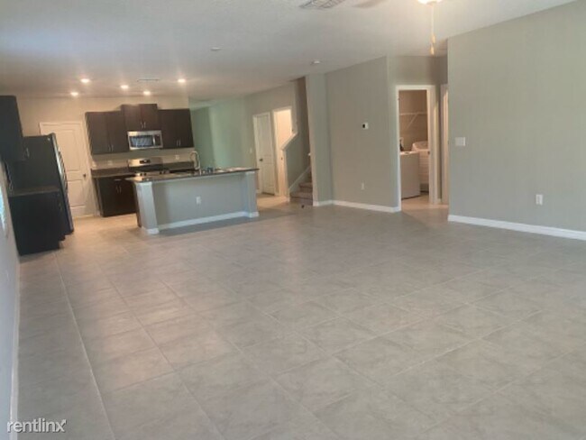 Building Photo - 5 br, 2.5 bath House - 5426 Amaryllis Gard...