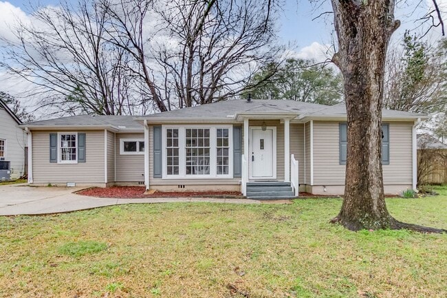 Building Photo - Three bedroom two bath