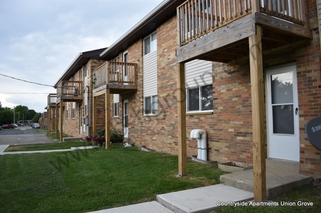 Building Photo - Countryside Apartments