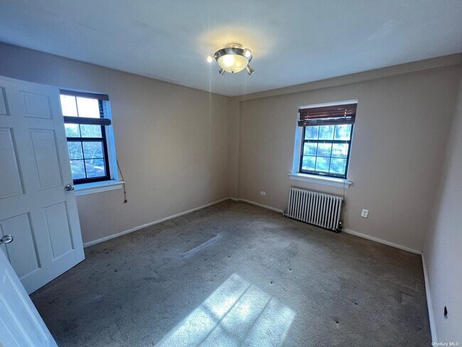 Building Photo - 147-11 79th Ave