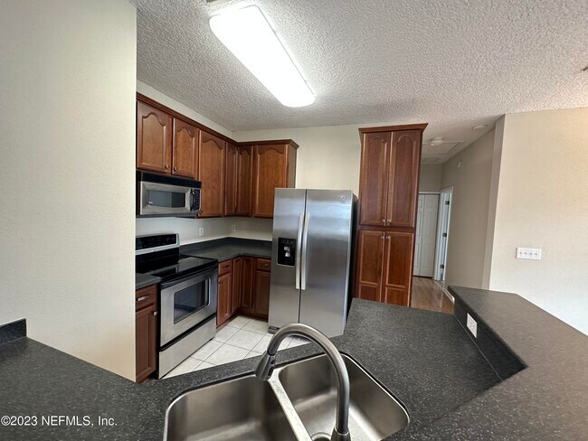 Building Photo - 7220 Deerfoot Cir