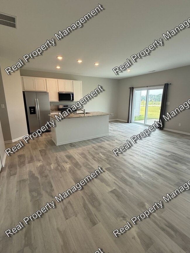 Building Photo - New Construction 3 Bedroom Townhome