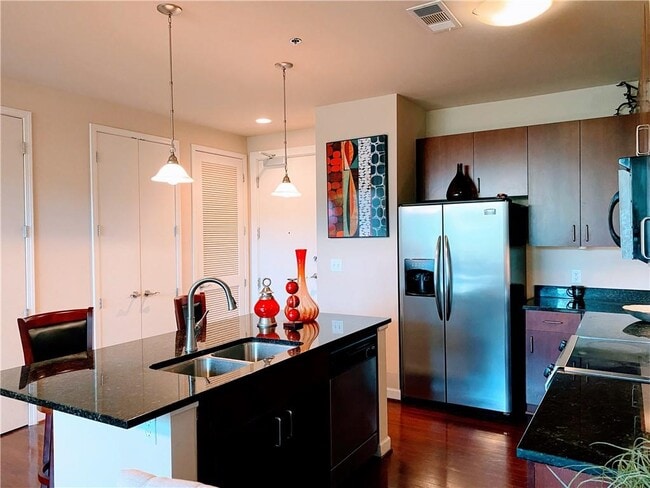 Building Photo - 711 Cosmopolitan Dr NE
