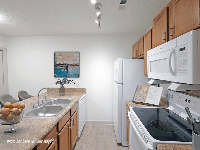 Spacious, Double-Galley Kitchen - The Park Apartment Homes
