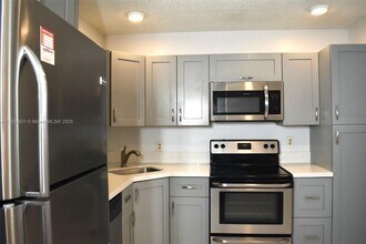 Building Photo - 4459 Carambola Cir S