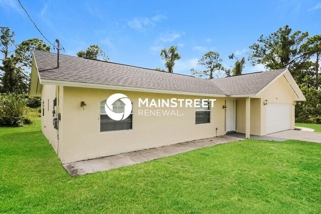 Building Photo - 3 Bedroom Pet-Friendly Home in LEHIGH ACRES, FL with Main Street Renewal