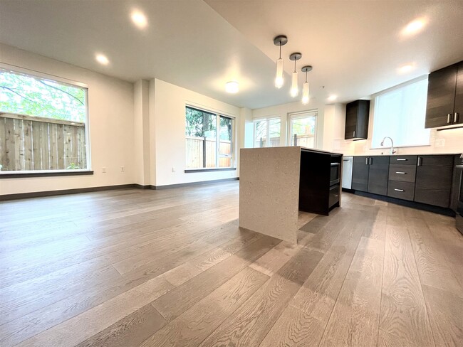 Open concept kitchen/dining/living area - 11903 NE 128th St