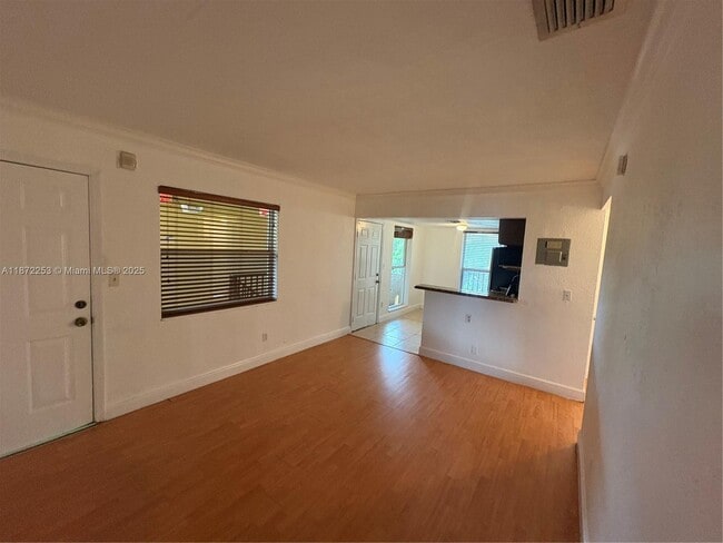 Building Photo - 241 S Royal Poinciana Blvd