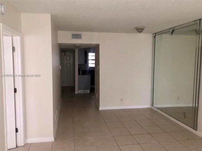 Building Photo - 11213 Royal Palm Blvd