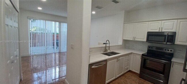 Building Photo - 5590 NW 107th Ave