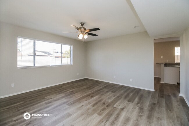 Building Photo - 3102 N 90th Ave