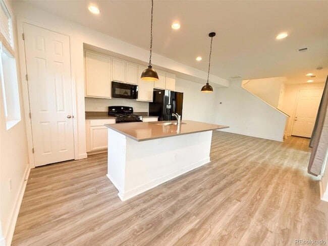 Photo - 591 S Pitkin Ct Townhome