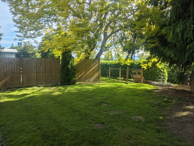 Private backyard that backs up against a nursery for tons of privacy. - 13125 Pulver Rd. Unit B
