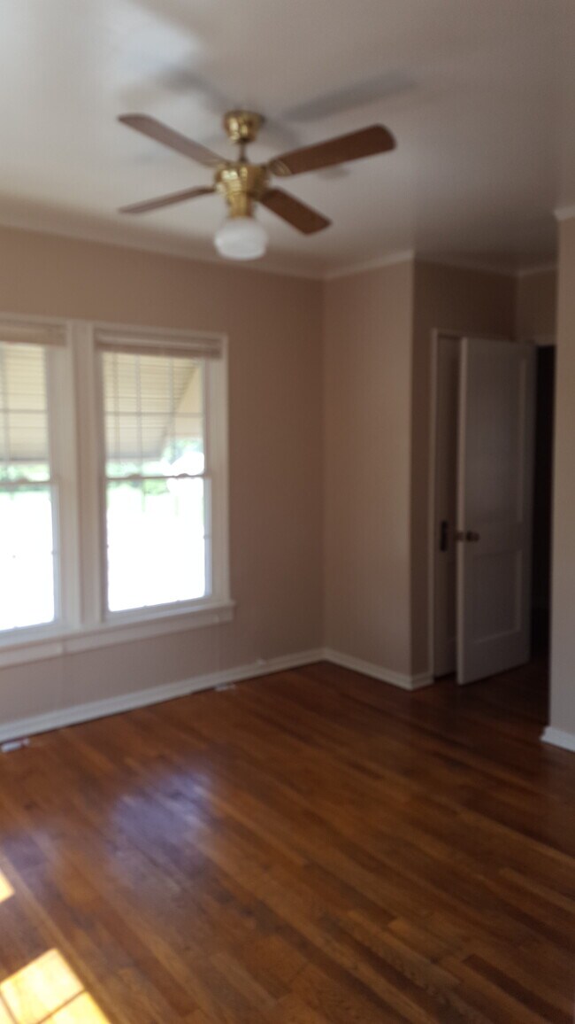 bedroom with passage to bath - 101 E 21st St
