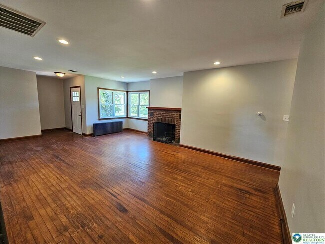 Building Photo - 6123 3rd Ave