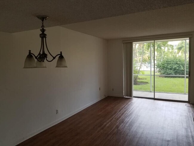 Living Room from Dining Area - 6700 Royal Palm Blvd