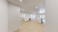 This contemporary 1,300 square foot single-story home in Saint George, Utah offers a harmonious blend of style and functionality. The open floor plan seamlessly integrates the kitchen, living, and dining areas, creating an inviting space for both everyday living and entertaining. The gourmet kitchen is a standout feature, boasting sleek white cabinetry, stainless steel appliances, and a generous island with a built-in sink, perfect for meal preparation and casual dining.

The home's three bedrooms provide ample space for rest and relaxation, with the primary suite measuring a comfortable 160 square feet. Two full bathrooms, finished with modern fixtures and neutral tones, offer convenience and privacy. Throughout the home, large windows allow natural light to flood the spaces, enhancing the bright and airy ambiance.

Attention to detail is evident in the home's finishes, from the stylish ceiling fans to the warm wood-look flooring that runs throughout. Recessed lighting adds a touch of sophistication, while the neutral color palette provides a versatile backdrop for any decor style. The property also includes practical features such as a closet for storage and two hallways for easy navigation.

Located at 5088 S Desert Color Pky, B214, this home combines the comfort of modern living with the beauty of its Saint George surroundings, making it an ideal residence for those seeking a contemporary lifestyle in a picturesque Utah setting.