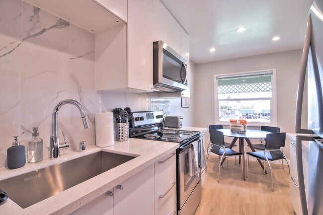 Building Photo - 988 East El Camino Real, Unit 990-3