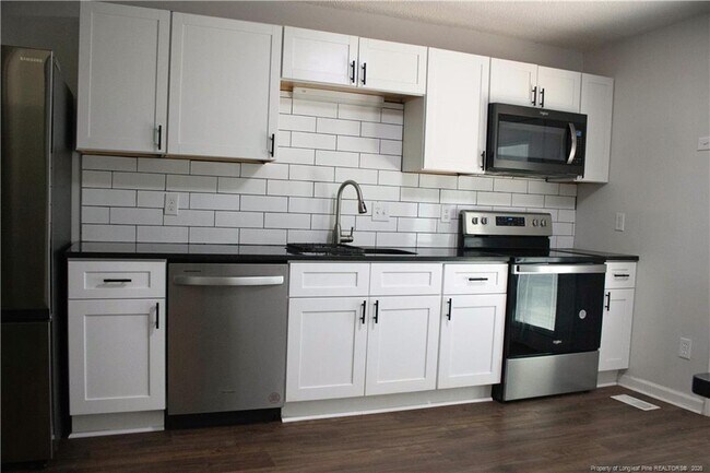 Foto del edificio - 5839 Rivercroft Rd