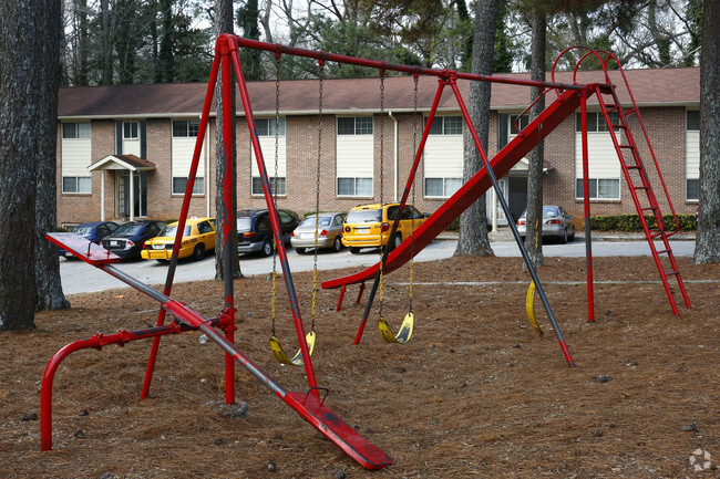 Área de juegos para niños - Carriage Oaks Apartments