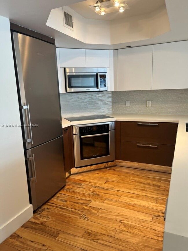 Building Photo - 8911 Collins Ave