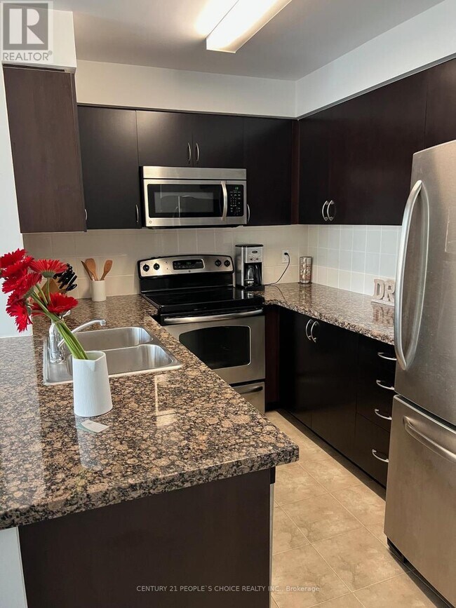 Photo du bâtiment - 4900-4900 Glen Erin Dr