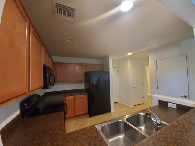 Building Photo - 10675 E Singing Canyon Dr