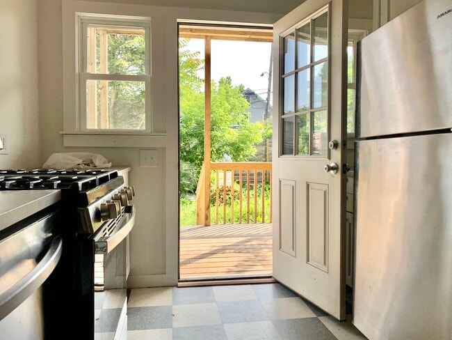 Kitchen leading to private porch & garden - 216 State St
