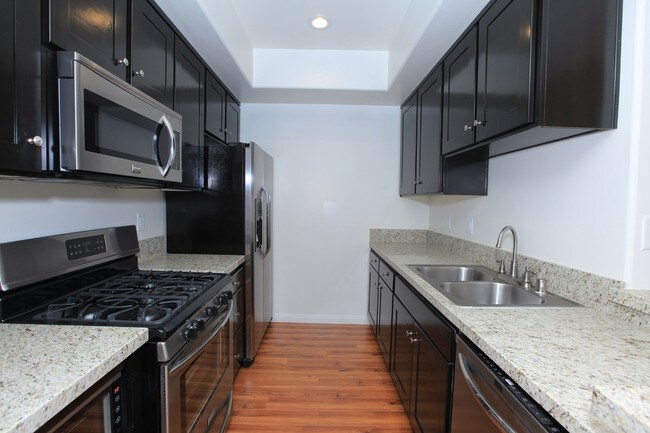 Kitchen - 14430 Benefit Street Apartments