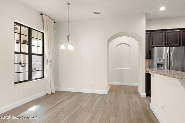 Building Photo - 7065 Primavera Ln