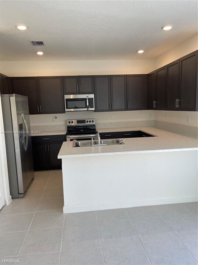 Building Photo - 3 br, 2.5 bath House - 13336 SW 287th Ter