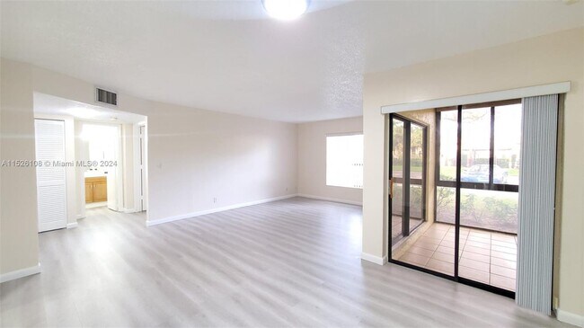 Building Photo - 3859 Cocoplum Cir