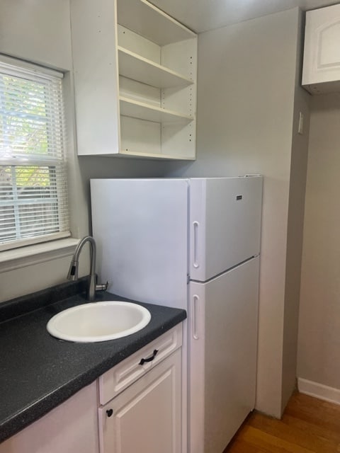 Building Photo - 1BR duplex with loft area, plenty of stora...
